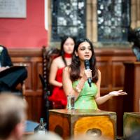 Saara Lunawat speaking from the despatch box in the Oxford Union debating chamber